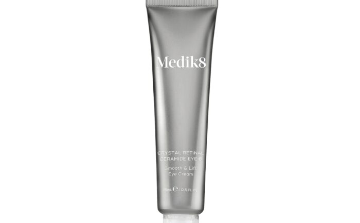 Medik8 eye cream tube against a white background.