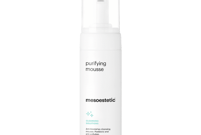 Purifying mousse cleanser bottle for oily, acne-prone skin.