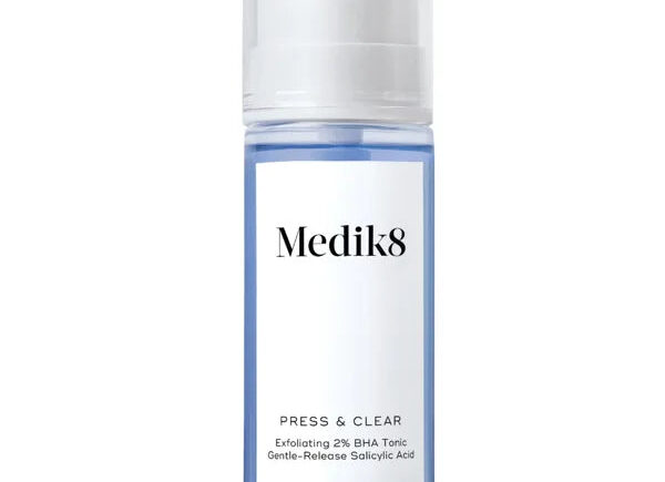 Medik8 Press & Clear exfoliating tonic in blue bottle.