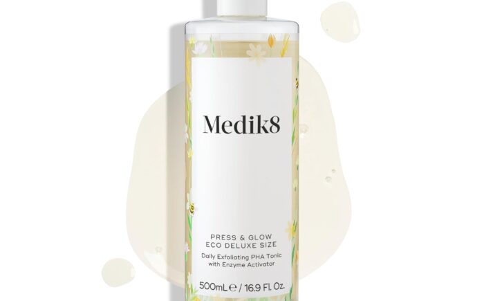 Medik8 Press & Glow exfoliating tonic bottle on white.