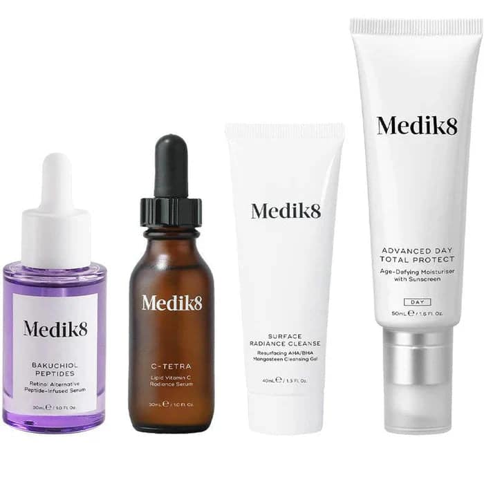Medik8 skincare products including serums, cleanser, and moisturizer.