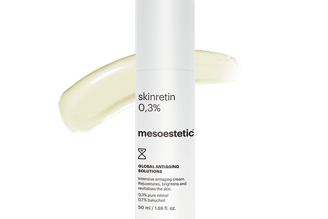 White bottle of Mesoestetic Skinretin with cream smudge.